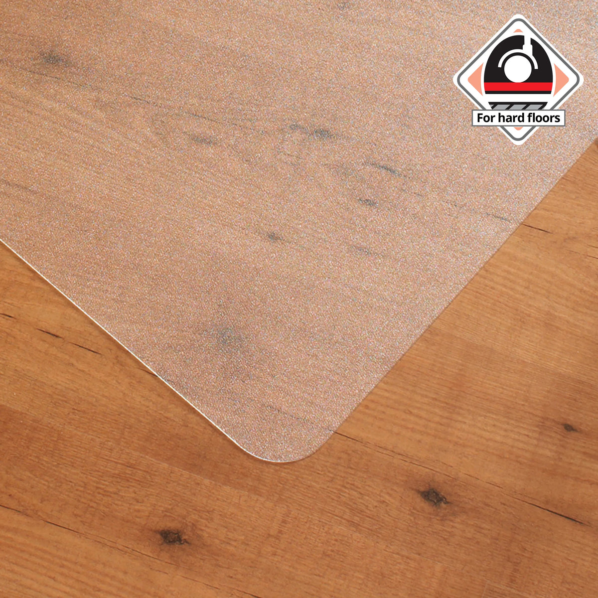 Transparente Bodenschutzmatte ULTIMAT aus Polycarbonat auf einem Holzfußboden von Floortex